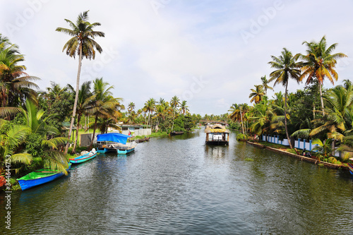 Boathouses sailing in the backwaters in Allepey, Kerala, India. © estivillml