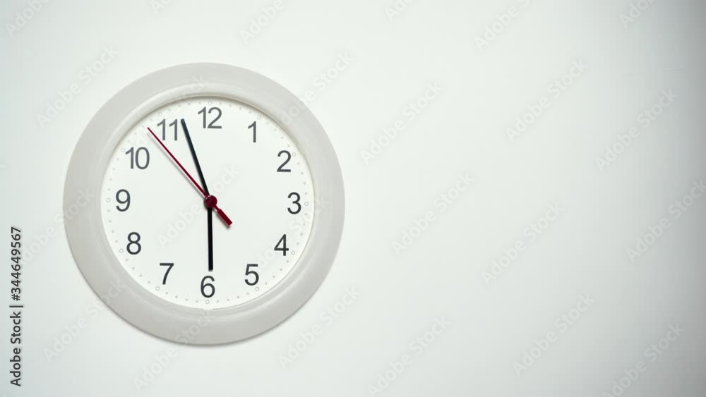 Wall clock ticking showing six hours. Time deadline concept. Time lapse. Wall clock ticking showing six hours. Time deadline concept. Time lapse.