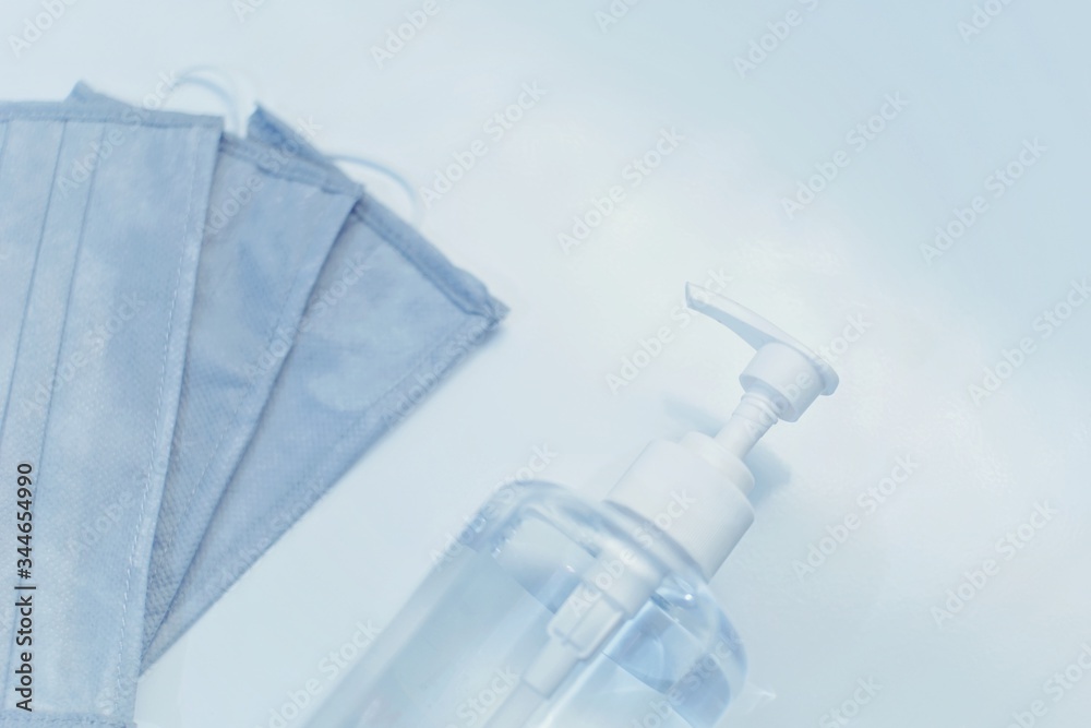 medical mask and hand sanitizer bottle with white background medical mask and hand sanitizer bottle with white background