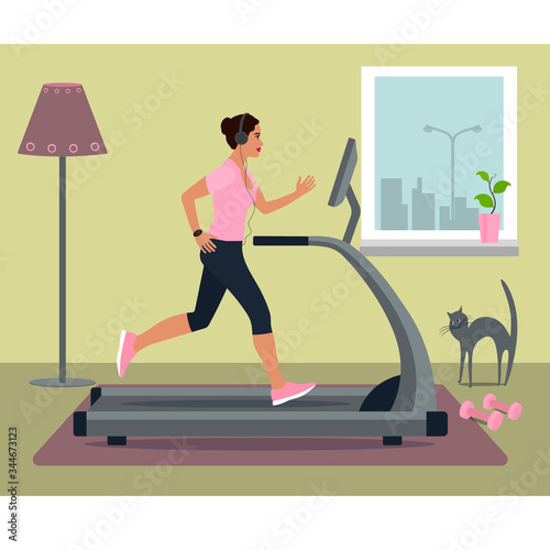 woman running on treadmill in headphones at home