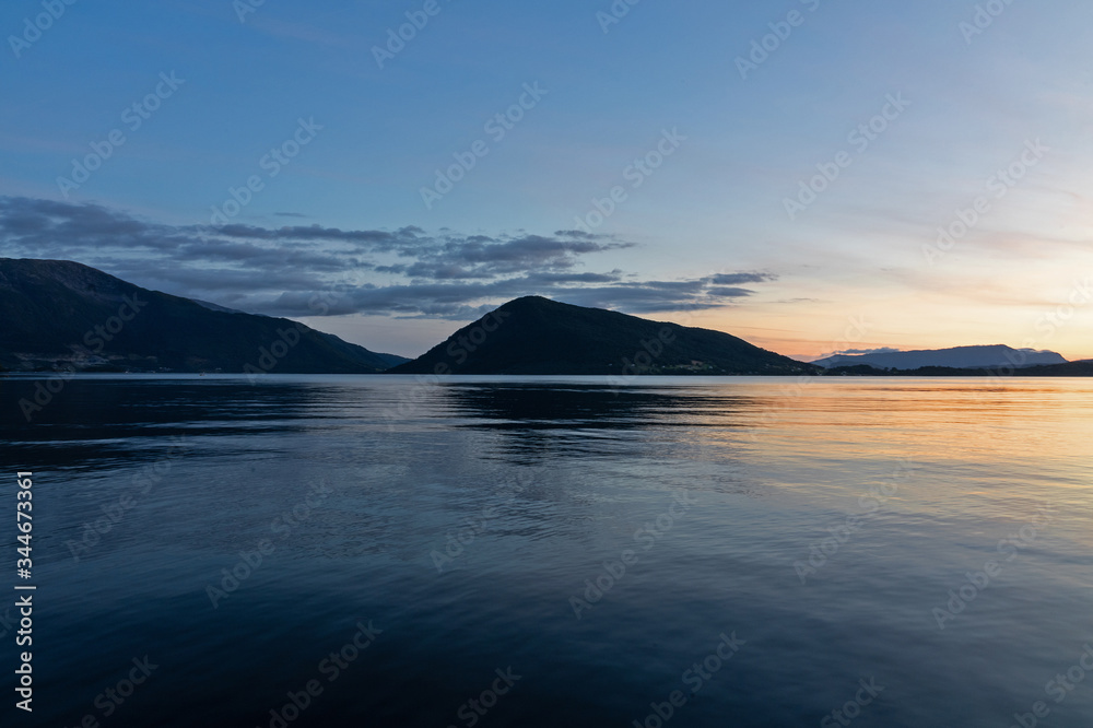 Mountain fjords sea view, Rosendal, Norway, sunset picturesque landscape Mountain fjords sea view, Rosendal, Norway, sunset picturesque landscape