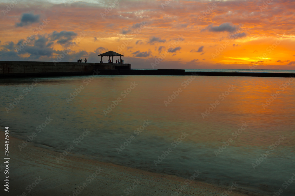 Sunset on Kapahula Pier and Waikiki Bay, Waikiki, Oahu, Hawaii, USA