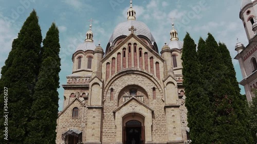 Large baroque brick church in a small town photo