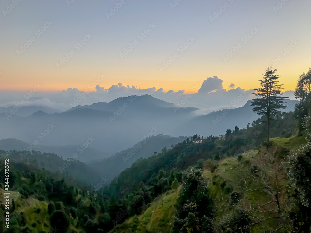 sunrise in the mountains Kanatal Dhanaulti Uttarakhand india
