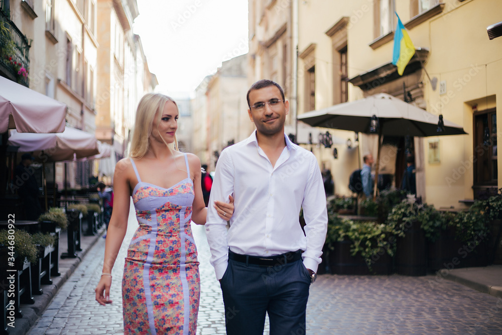Loving couple walking in the city. Lviv