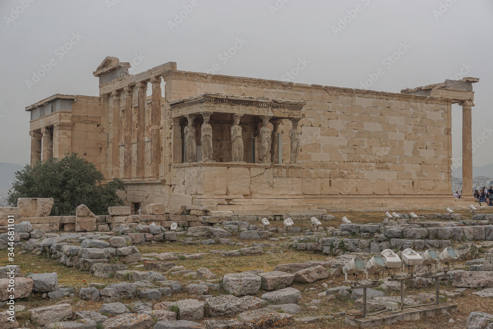 Athens, Greece: The Erechtheion at the Acropolis, constructed in the Ionic style between 421 and 405 BC. The porch of the Caryatids is on the south side.
