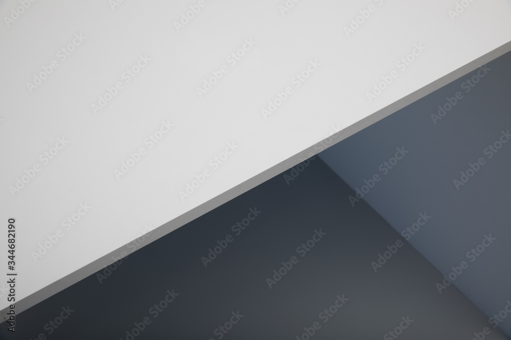 angular abstract background with shades of white and gray colors
