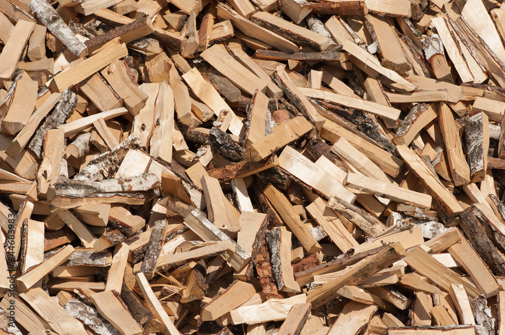 birch firewood stacked in a large pile interspersed
birch firewood stacked in a large pile interspersed
