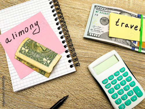 One parent splits money for himself and for the payment of alimony for his child photo