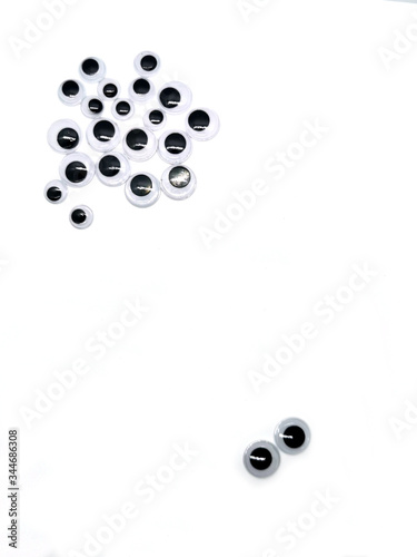 
google eyes on a white background, artificial plastic eyes for dolls, needlework on a white background
