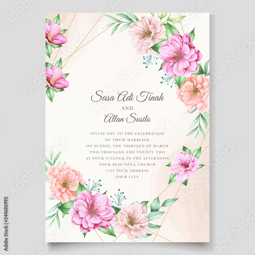 elegant wedding invitation card with cherry blossom floral designs © lukasdedi