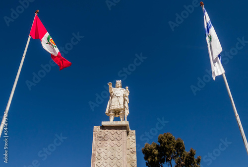 conqueror statue in Island Amantany Perú photo