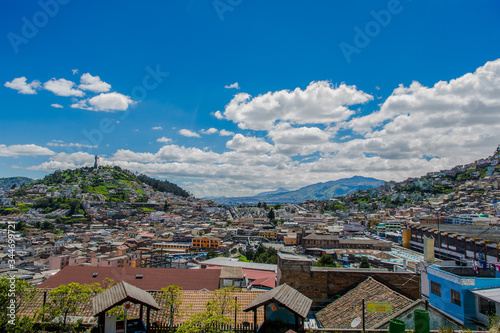 QUITO, ECUADOR, FEBRUARY 02, 2018: High view of the city of Quito and some buildings, with Panecillo hill in the top of the mountain