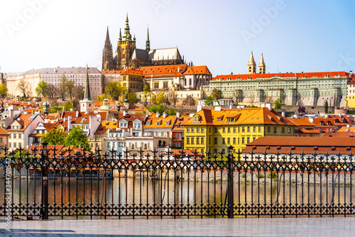 Scenic view of Prague Castle, Czech: Prazsky Hrad, from Vltava River embankment on sunny spring day, Praha, Czech Republic