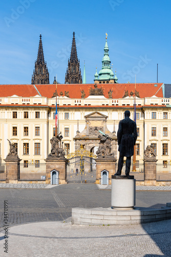 Hradcany square with entrance gate to Prague Castle and statue of Tomas Garrigue Masaryk - the first President of Czechoslovakia, Praha, Czech Republic photo