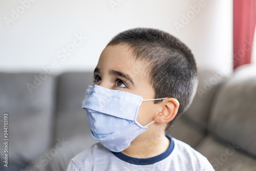 child with a facial mask