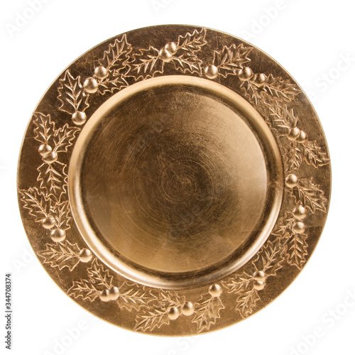 The luxurious gold plate is decorated with ornaments.The view from the top.