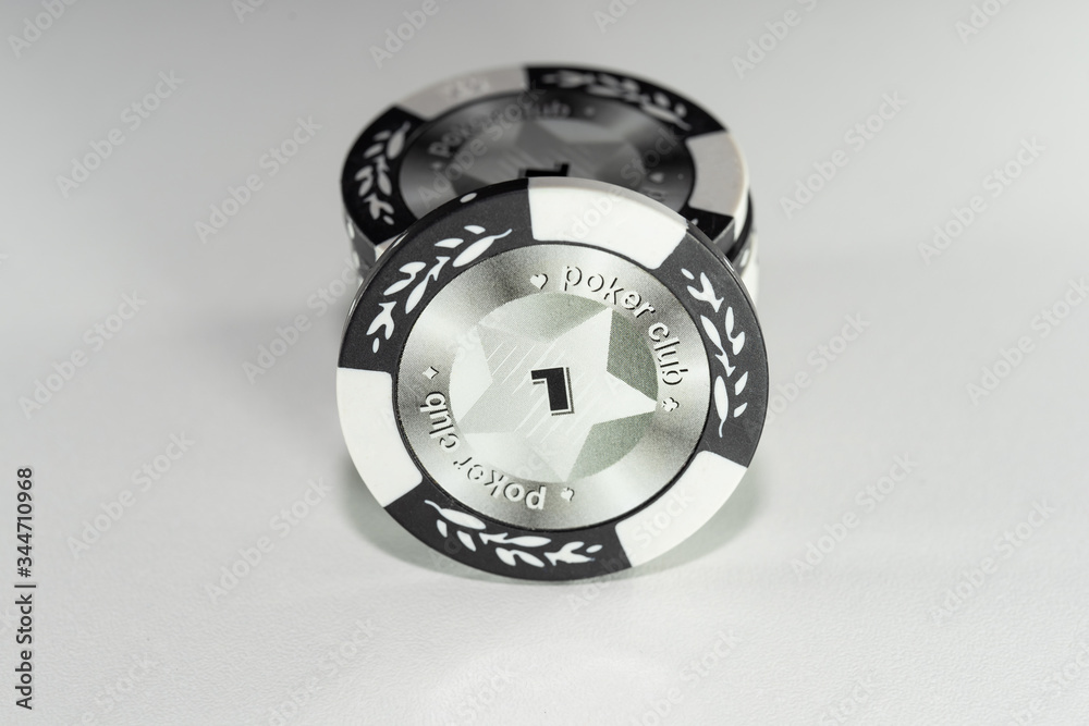 1 white casino chips on a white background 1 white casino chips on a white background