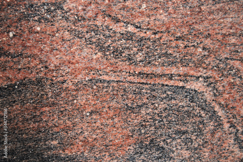 Image of a polished granite texture of the multicolored type of red color
