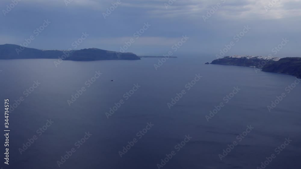 POV right to left view of the Aegean sea from the island of Santorini in Greece POV right to left view of the Aegean sea from the island of Santorini in Greece