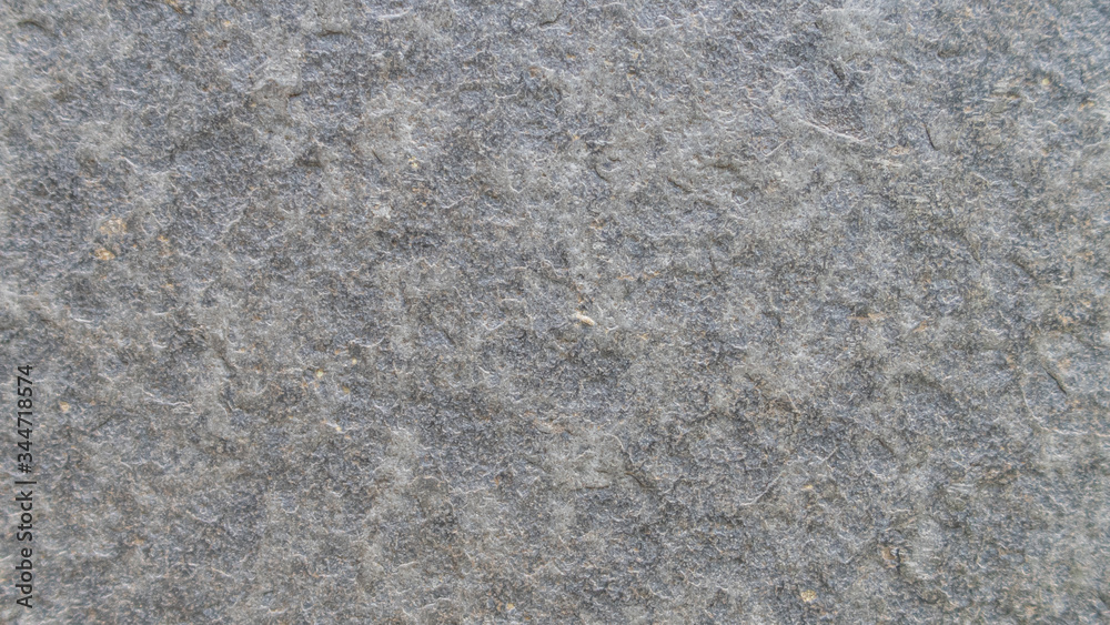 Rough surface of gray granite stone Rough surface of gray granite stone