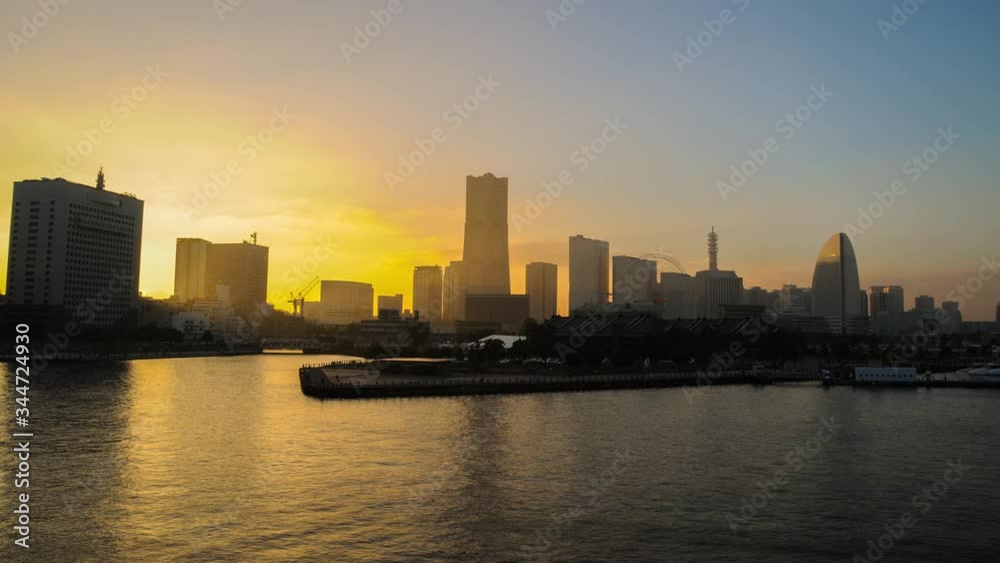 Timelapse of Yokohama from Osanbashi Pier. Minato Mirai 21 district can be seen as the sun sets and the night takes over the scene. Timelapse of Yokohama from Osanbashi Pier. Minato Mirai 21 district can be seen as the sun sets and the night takes over the scene.