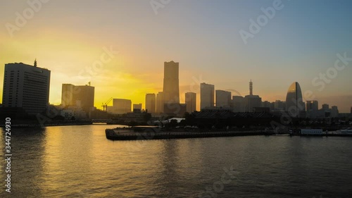 Timelapse of Yokohama from Osanbashi Pier. Minato Mirai 21 district can be seen as the sun sets and the night takes over the scene.