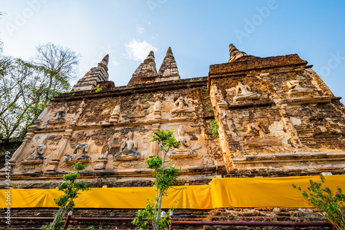 Ancient pagoda in Chet Yod temple photo