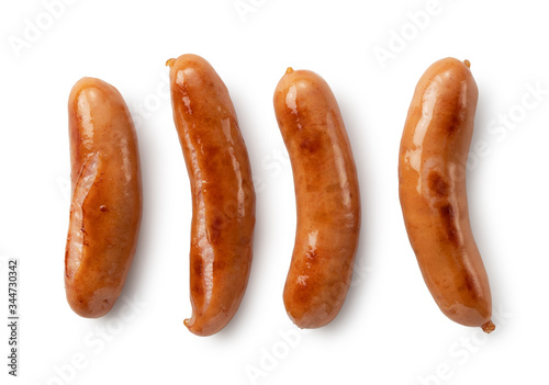 Baked sausages placed on a white background