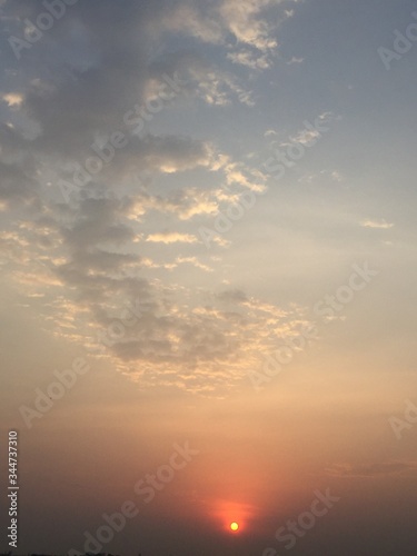 beautiful scenario of the early sunrise with attractive clouds
