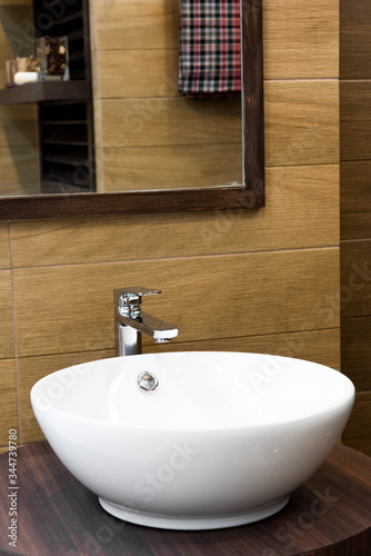 Bathroom interior with sink and faucet