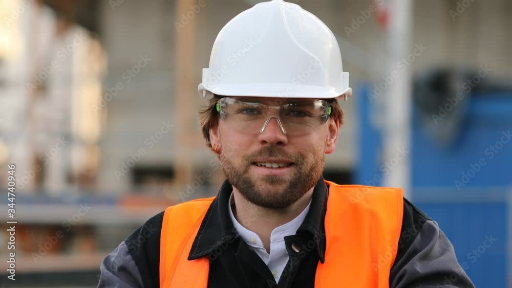 Portrait of smiling engineer wearing helmet Portrait of smiling engineer wearing helmet
