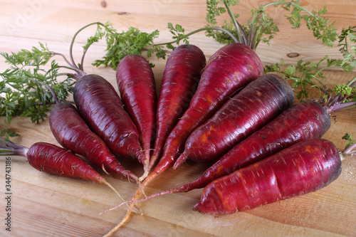 Red carrots on table