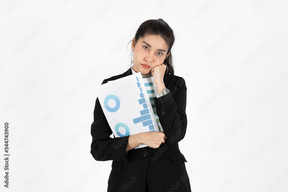 Upset stressed young Asian business woman holding charts or paper work and feeling disappointed over white isolated background. Upset stressed young Asian business woman holding charts or paper work and feeling disappointed over white isolated background.