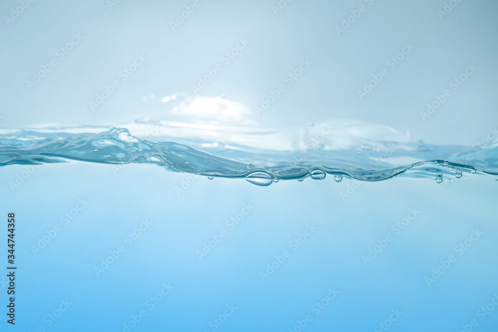 Water splash. Aqua flowing in waves and creating bubbles. Drops on the water surface feel fresh and clean. isolated on white background. Water splash. Aqua flowing in waves and creating bubbles. Drops on the water surface feel fresh and clean. isolated on white background.