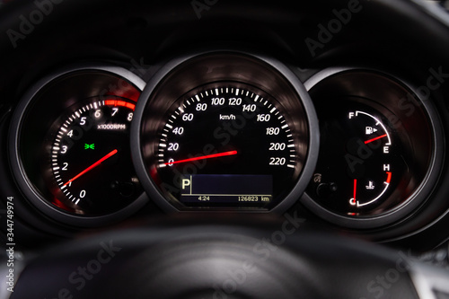 Car panel, digital bright speedometer, odometer and other tools. photo
