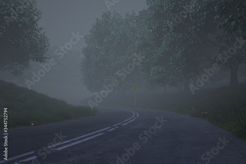 霧がかかる山中の道路