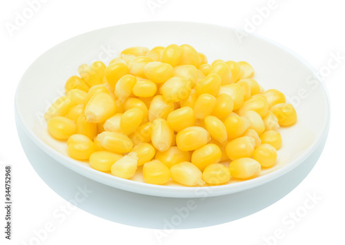 Boiled corn seeds in white plate isolated on white background.