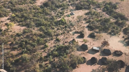 Aerial view of a jeep near tribal village in Angola, Africa