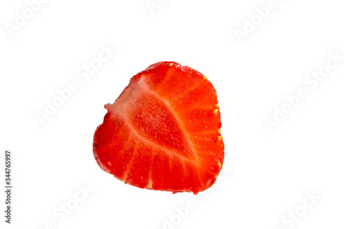 Half of ripe strawberries on a white background.