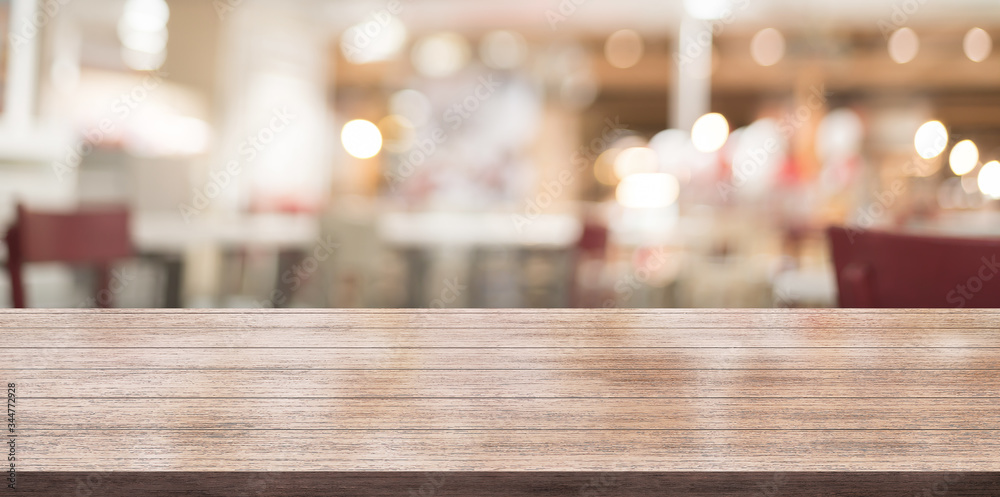 3D Rendering, Wooden top table with bokeh light effect and blur restaurant on background, blur background 3D Rendering, Wooden top table with bokeh light effect and blur restaurant on background, blur background