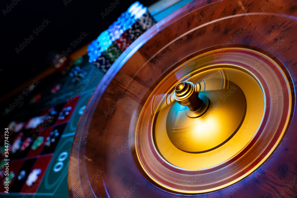 Spinning Roulette table close up at the Casino - Selective Focus Spinning Roulette table close up at the Casino - Selective Focus