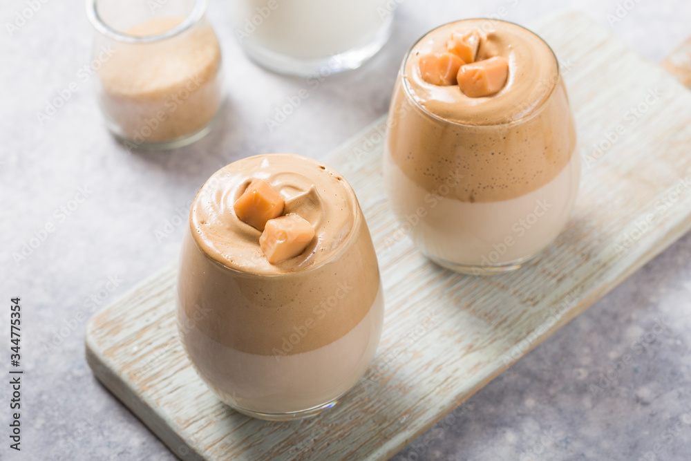 Dalgona Frothy Coffee is a South Korean drink with whipped instant coffee, sugar and milk, caramel Dalgona Frothy Coffee is a South Korean drink with whipped instant coffee, sugar and milk, caramel