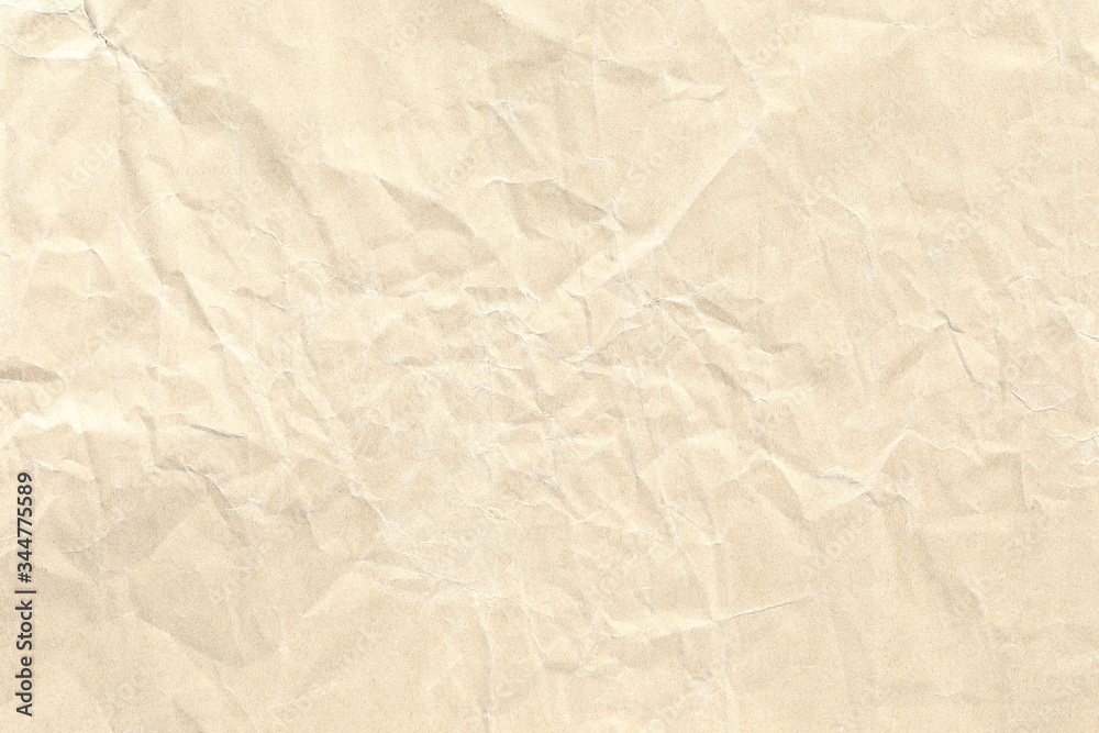 Old pale yellow crumpled paper background texture Old pale yellow crumpled paper background texture