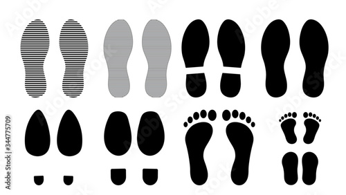 Footprints human silhouette, vector set, isolated on white background. Shoe soles print. Foot print tread, boots, sneakers. Impression icon barefoot. photo