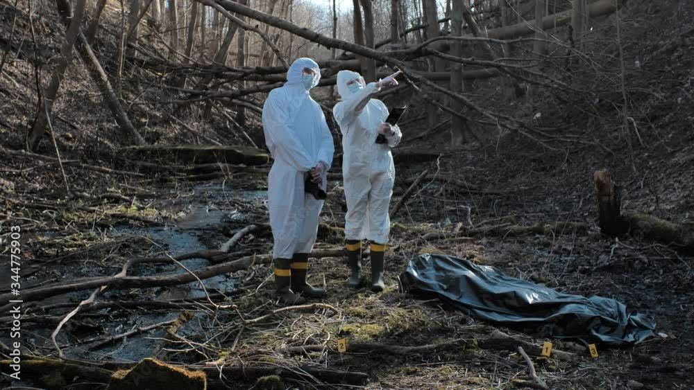 Detectives collecting evidence in a crime scene. Forensic specialists making expertise. Police officers and investigation.