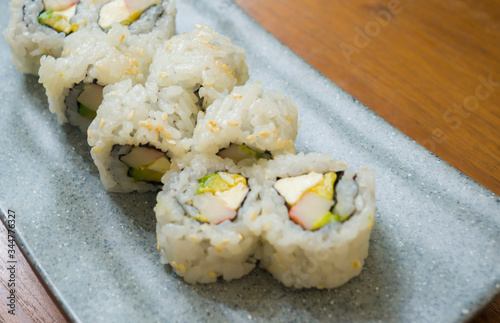 delicious and delicate dish of Japanese sushi rolls on beautiful slate set up in traditional healthy Asian food and creative oriental dining concept - Japan gourmet cuisine