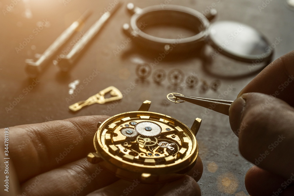 Mechanical watch repair. Watchmaker is repairing the mechanical watches Mechanical watch repair. Watchmaker is repairing the mechanical watches
