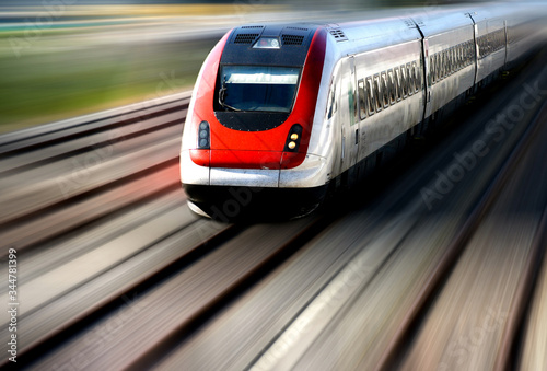 Train Speeding along its Tracks with Motion Blur. Train Moving Fast, Speed on its Track. Object Focus