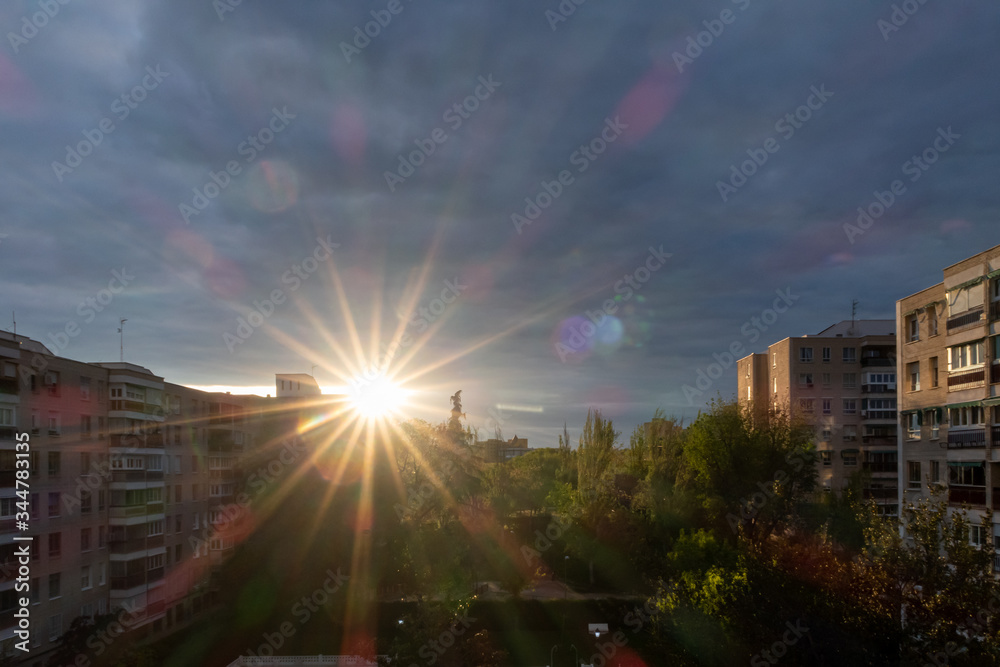 Fototapeta premium Dawn View over housing in Madrid with Dramatic Sky